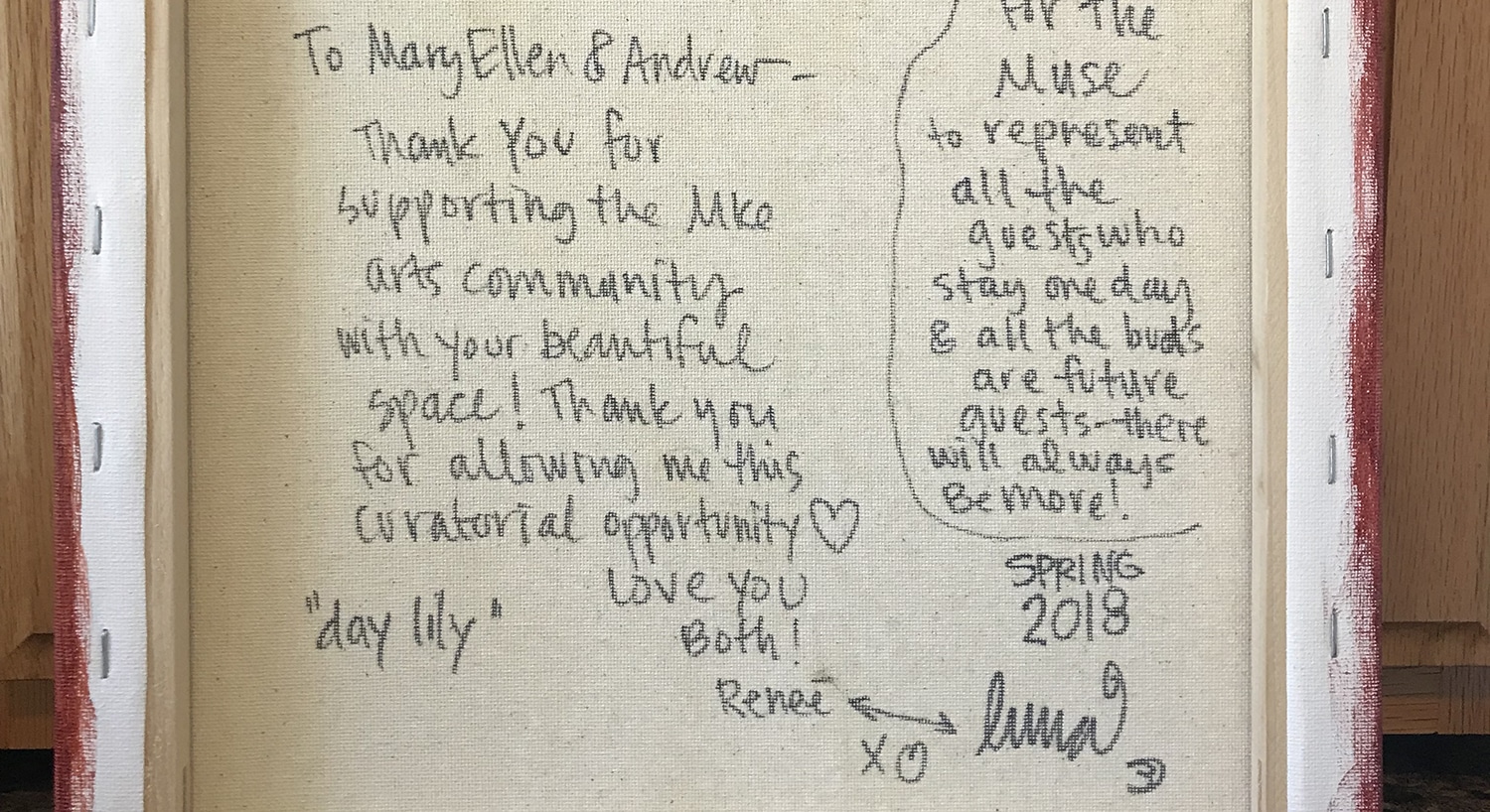 A note from artist Renee Luna written on the canvas back of a painting to Mary Ellen and Andrew