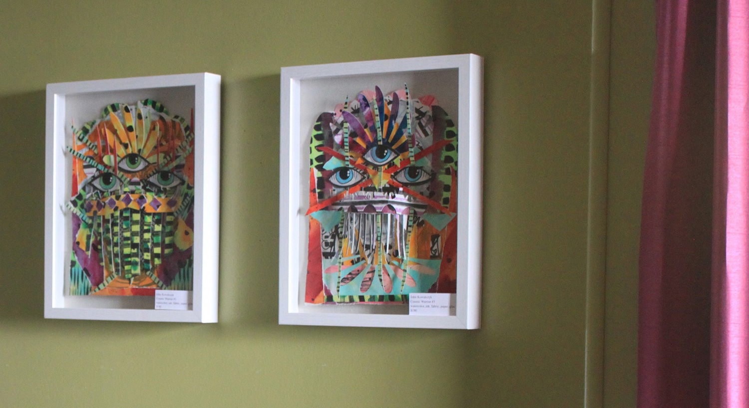 Two white-framed mixed-media artworks made from paper and pigment.